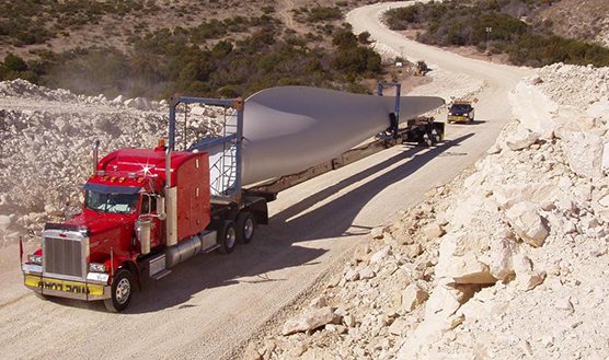 Lone Star Transportation truck hauling wind turbine blade