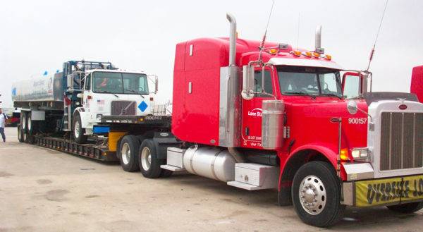 aerospace-slider2 Lone Star truck transporting airport vehicle