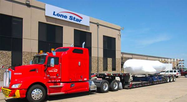 aerospace-slider4 Lone Star truck with wrapped airplane piece on flatbed