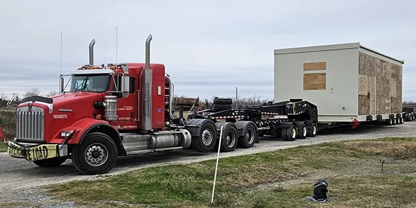 AI_DataCenters_Slider1 Lone Star heavy haul trailer transporting data center equipment