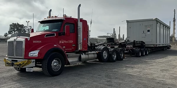 AI_DataCenters_Slider2 Lone Star truck hauling data center project container