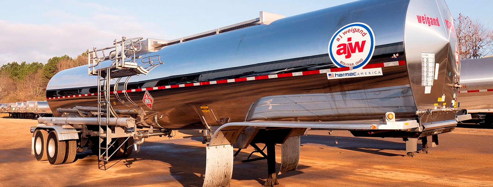 A J Weigand liquid tanker parked in truck yard