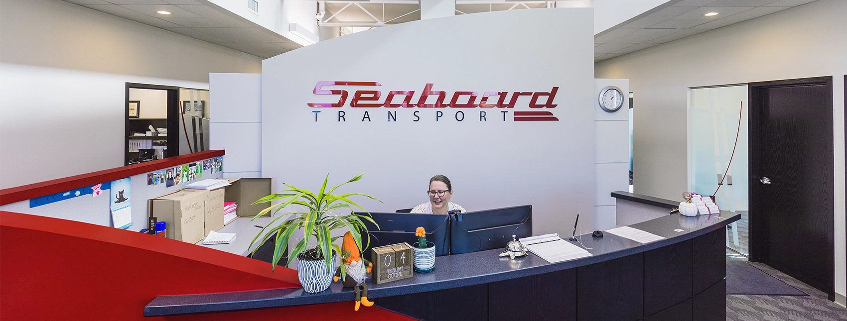 Seaboard Transport receptionist seated at front desk