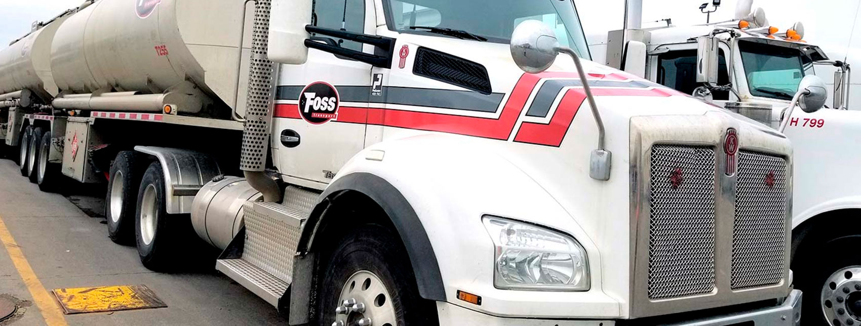 G.A. Foss double tanker truck parked in yard