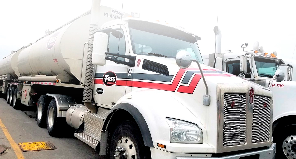 G.A. Foss double tanker truck parked in yard